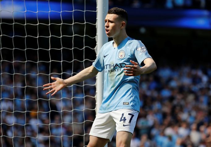 Soccer Football - Premier League - Manchester City v Tottenham Hotspur - Etihad Stadium, Manchester, Britain - April 20, 2019  Manchester City's Phil Foden celebrates sco