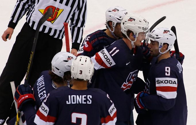 Brock Nelson of the U.S. (C) celebrates after scoring against the Czech Republic during their men's ice hockey World Championship quarter-final game at Chizhovka Arena in