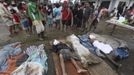 ATTENTION EDITORS - VISUAL COVERAGE OF SCENES OF DEATH AND INJURY Villagers look for their relatives among flash flood victims after Typhoon Bopha hit New Bataan in Compostela province, southern Philippines December 5, 2012. Bopha, the Philippines' strongest typhoon this year, was headed towards tourist destinations on Wednesday after hitting a southern island, destroying homes, causing landslides and killing at least 82 people, but many more are reported dead and missing. REUTERS/Karlos Manlupig(PHILIPPINES - Tags: DISASTER ENVIRONMENT TPX IMAGES OF THE DAY) TEMPLATE OUT Published: Pro. 5, 2012, 6:11 dop.