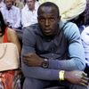 Jamajský sprinter Usain Bolt sleduje basketbalové utkání NBA 2012/13 mezi Miami Heat a Bostonem Celtics.
