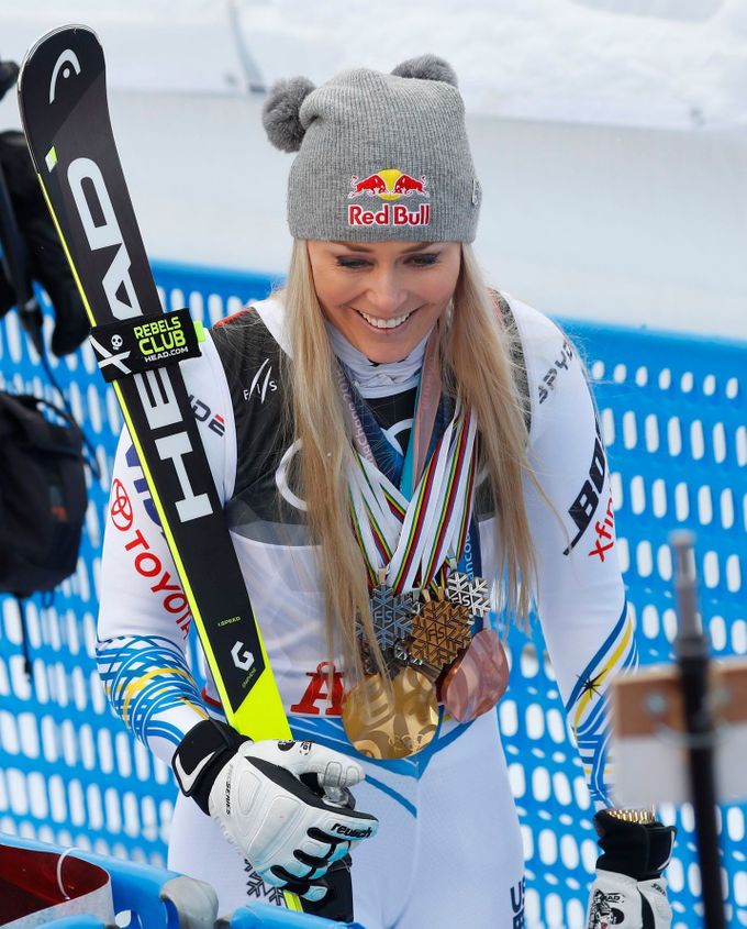 Alpine Skiing - FIS Alpine World Ski Championships - Women's Downhill - Are, Sweden - February 10, 2019 - Bronze medalist Lindsey Vonn of the U.S. poses with all medals s