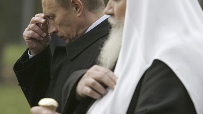 Vladimir Putin s patriarchou ruské pravoslavné církve Alexijem II.