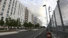 Perimeter fencing of the Olympic Village, built for the London 2012 Olympic Games, is seen in Stratford, east London on June 29, 2012. The village will accomodate up to 16,000 athletes and officials from more than 200 nations. Picture taken June 29, 2012. REUTERS/Olivia Harris (BRITAIN - Tags: SPORT BUSINESS CONSTRUCTION CITYSPACE OLYMPICS) Published: Čer. 30, 2012, 12:30 odp.