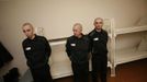 Inmates stand inside a temporary cell for recently arrived prisoners at a high-security male prison camp outside Russia's Siberian city of Krasnoyarsk May 14, 2013. High-security male prison camp number 17 is intended to house male inmates who are serving a sentence for the first time, and have been convicted for serious crimes. Prisoners at the facility work in wood and metal processing shops, manufacture furniture, sew clothes and do other kinds of work. They can also take part in educational, sport and cultural programs. Picture taken May 14, 2013. REUTERS/Ilya Naymushin (RUSSIA - Tags: CRIME LAW SOCIETY) ATTENTION EDITORS: PICTURE 20 OF 29 FOR PACKAGE 'INSIDE SIBERIA'S PRISONS' SEARCH 'ILYA PRISON' FOR ALL IMAGES Published: Čer. 19, 2013, 10:04 dop.