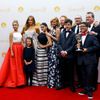 The cast and crew of ABC's &quot;Modern Family&quot; pose with their award for Outstanding Comedy Series at the 66th Primetime Emmy Awards in Los Angeles