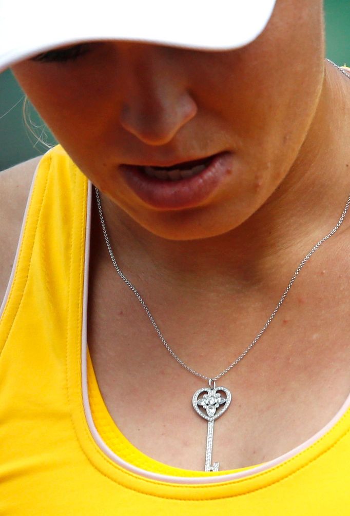 Caroline Wozniacki of Denmark reacts during the women's singles match against Julia Goerges of Germany during their women's singles match at the French Open tennis tourna