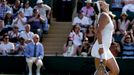 Victoria Azarenka of Belarus celebrates after winning her match against Kristina Mladenovic of France at the Wimbledon Tennis Championships in London