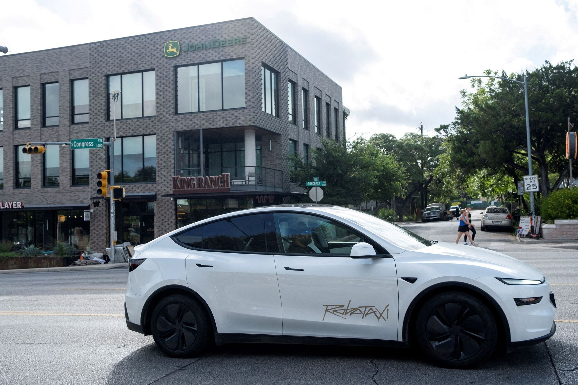 FILE PHOTO: FILE PHOTO: Tesla robotaxis launch in Austin, Texas