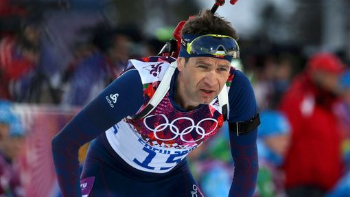 Norway's Bjoerndalen reacts during the men's biathlon 20 km individual event at the Sochi 2014 Winter Olympic Games in Rosa Khutor