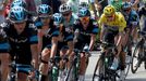 Race leader's yellow jersey Team Sky rider Christopher Froome (R) of Britain cyles with team mates during the 242.5 km fifteenth stage of the centenary Tour de France cyc