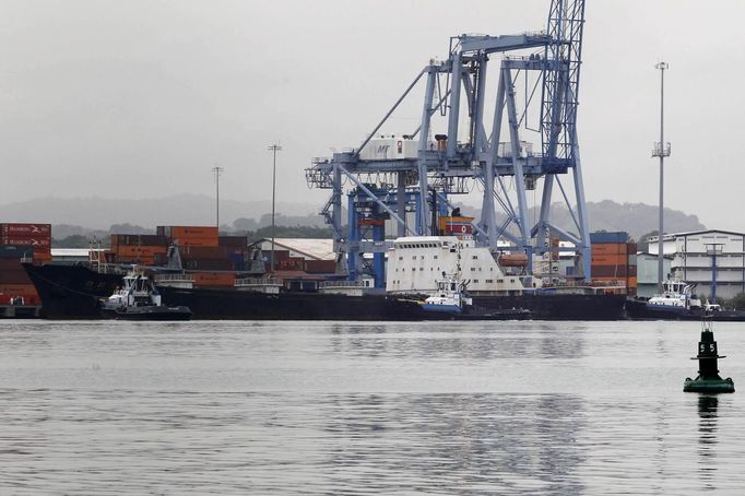 North Korean container ship ''Chong Chon Gang'' docks at the Manzanillo International Container Terminal in Colon City July 16, 2013. Panama detained the North Korean-flagged ship from Cuba as it headed to the Panama Canal and said it was hiding weapons in brown sugar containers, sparking a standoff in which the ship's captain attempted to commit suicide. REUTERS/Carlos Jasso (PANAMA - Tags: MARITIME MILITARY)