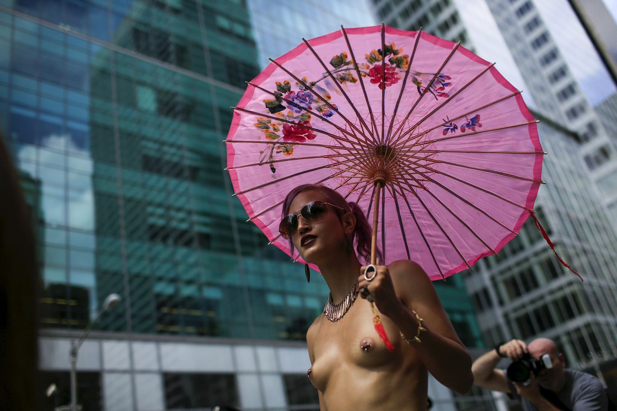 A woman takes part in a topless march in New York