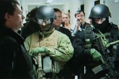 Military police raid Prague seat of Czech Television