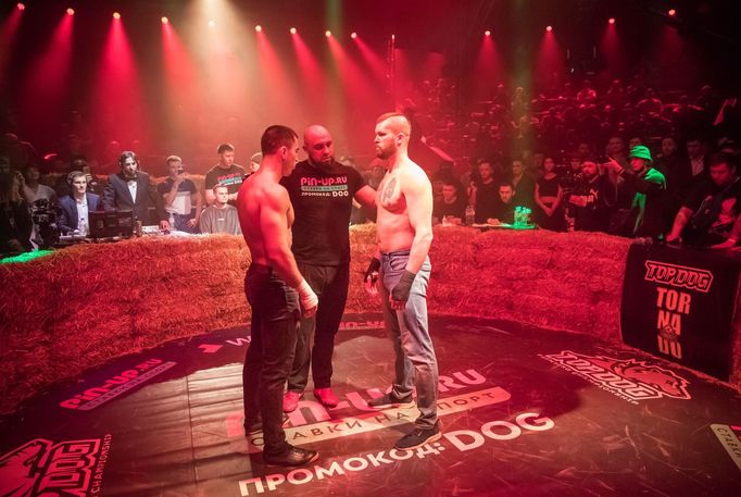 Rustam "Asteroid" and Anton "Charon" take part in the "Top Dog" bare-knuckle boxing tournament in Moscow, Russia April 16, 2021. Picture taken April 16, 2021. REUTERS/Sha