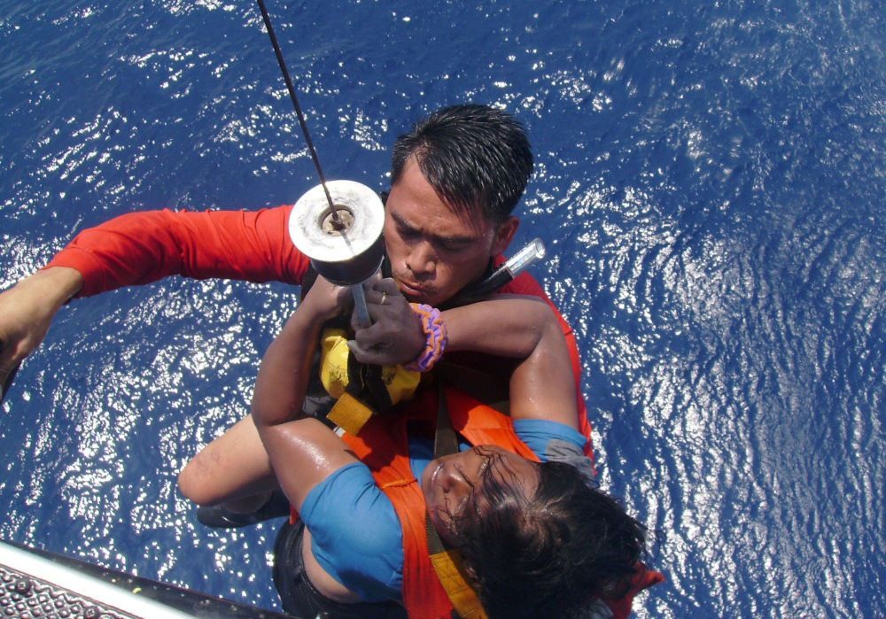 Filipíny - zachráněná žena
