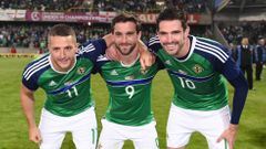 Northern Ireland's Conor Washington, William Grigg and Kyle Lafferty pose for photos before they leave for Euro 2016