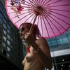 A woman takes part in a topless march in New York