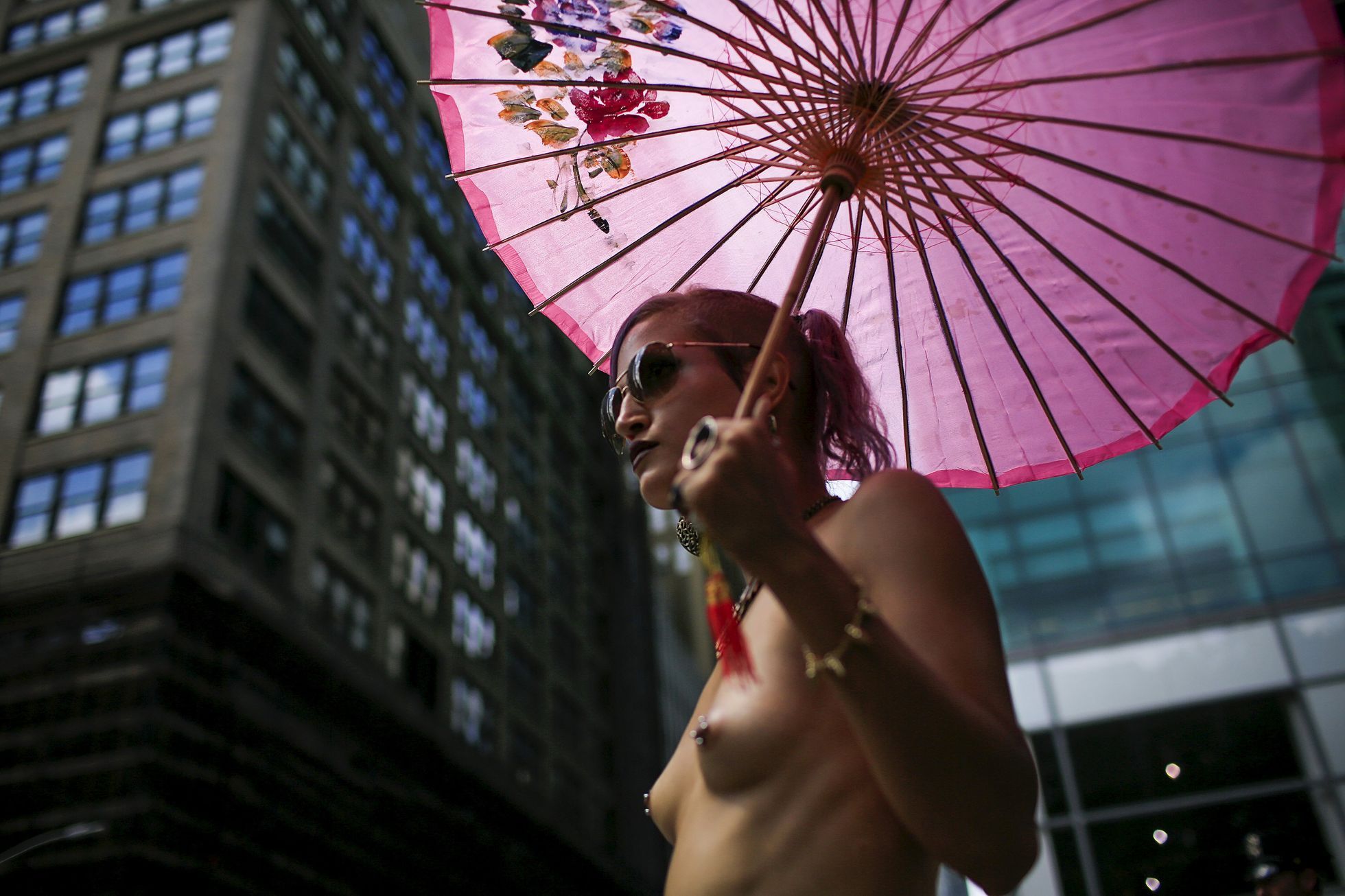 A woman takes part in a topless march in New York