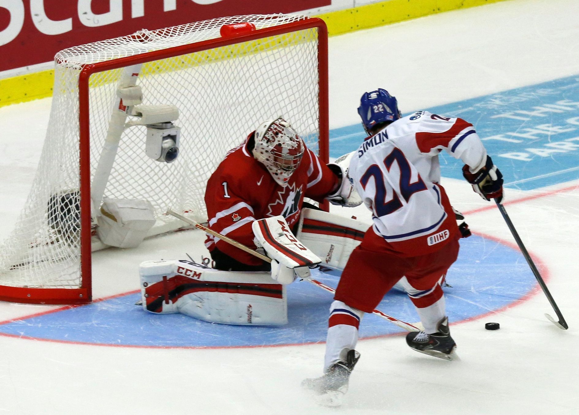 Czech Republic's Simon scores the game winning goal on Canada's goalie Paterson during a shootout in their IIHF World Junior Championship ice hockey game in Malmo