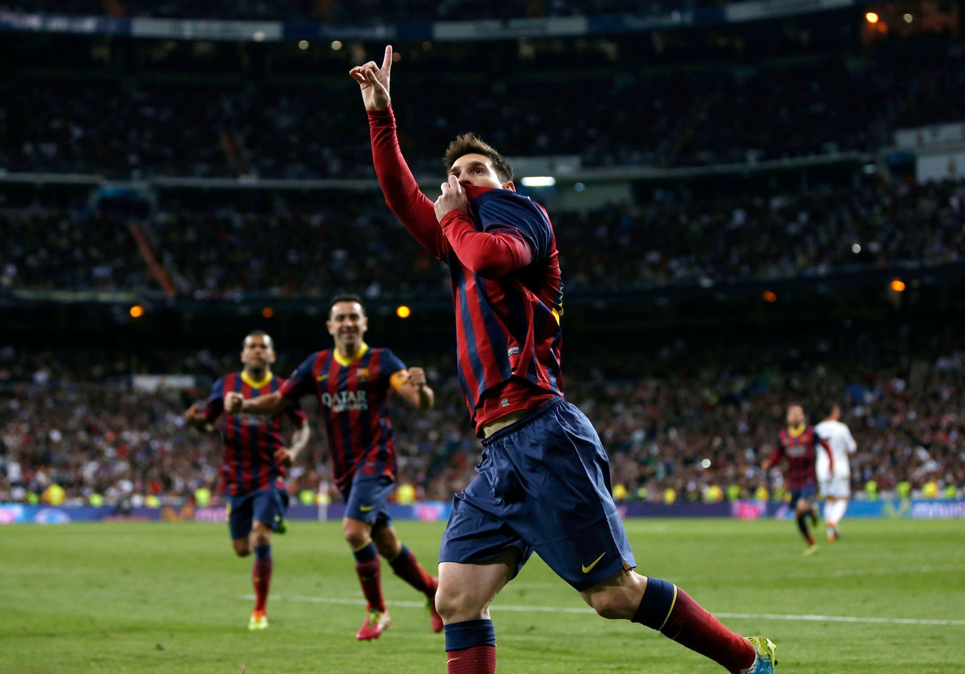 Barcelona's Messi celebrates after scoring a penalty goal against Real Madrid during La Liga's second 'Clasico' soccer match of the season in Madrid