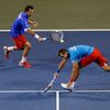 Czech Republic's Stepanek hits a return beside his compatriot Rosol during their Davis Cup quarter-final men's doubles tennis match against Japan's Ito and Uchiyama in Tokyo