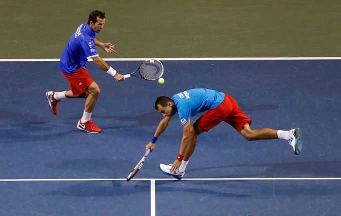 Czech Republic's Stepanek hits a return beside his compatriot Rosol during their Davis Cup quarter-final men's doubles tennis match against Japan's Ito and Uchiyama in To