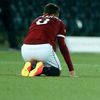 Sparta Prague's Matejovsky kneels on the pitch dejected after losing to BSC Young Boys in Europa League match in Bern