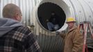 Paul Seyfried (R) talks with staff members Troy Schiff (L) and Dave Cox about a bunker they are constructing for client at Utah Shelter Systems in North Salt Lake, Utah, December 12, 2012. The price of the shelters range from $51,800 to $64,900. While most "preppers" discount the Mayan calendar prophecy, many are preparing to be self-sufficient for threats like nuclear war, natural disaster, famine and economic collapse. Picture taken December 12, 2012. REUTERS/Jim Urquhart (UNITED STATES - Tags: SOCIETY BUSINESS CONSTRUCTION) Published: Pro. 18, 2012, 5:24 odp.