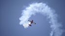 An Extra 330SC takes part in a flying display during the opening of the 50th Paris Air Show at Le Bourget airport near Paris June 17, 2013. The Paris Air Show runs from June 17 to 23. REUTERS/Pascal Rossignol (FRANCE - Tags: BUSINESS TRANSPORT MILITARY)