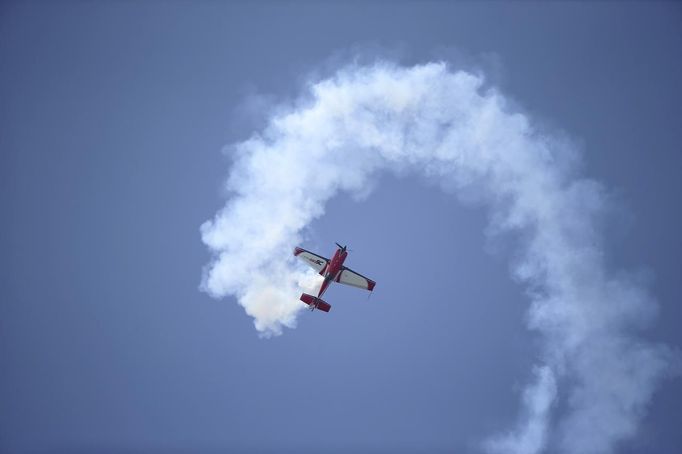 An Extra 330SC takes part in a flying display during the opening of the 50th Paris Air Show at Le Bourget airport near Paris June 17, 2013. The Paris Air Show runs from June 17 to 23. REUTERS/Pascal Rossignol (FRANCE - Tags: BUSINESS TRANSPORT MILITARY)