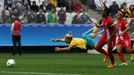 Katrina Gorry (AUS) of Australia with Kadeisha Buchanan (CAN) of Canada and Desiree Scott (CAN) of Canada in action.