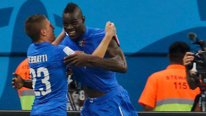 Italy's Mario Balotelli (R) and his teammate Marco Verratti celebrate after Balotelli scored a goal against England during their 2014 World Cup Group D soccer match at th