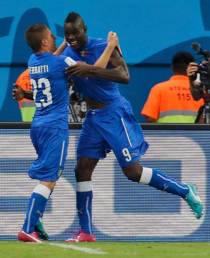 Italy's Mario Balotelli (R) and his teammate Marco Verratti celebrate after Balotelli scored a goal against England during their 2014 World Cup Group D soccer match at th