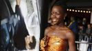 Cast member Lupita Nyong'o poses at the premiere of the film &quot;Non-Stop&quot;