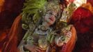 A reveller from the Beija Flor samba school participates during the annual carnival parade in Rio de Janeiro's Sambadrome, February 11, 2013. REUTERS/Pilar Olivares (BRAZIL - Tags: SOCIETY TPX IMAGES OF THE DAY) Published: Úno. 12, 2013, 3:51 dop.