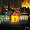 Images of Terra Cotta Warriors are projected on a building during a light show as part of a New Year countdown celebration rehearsal on The Bund in Shanghai