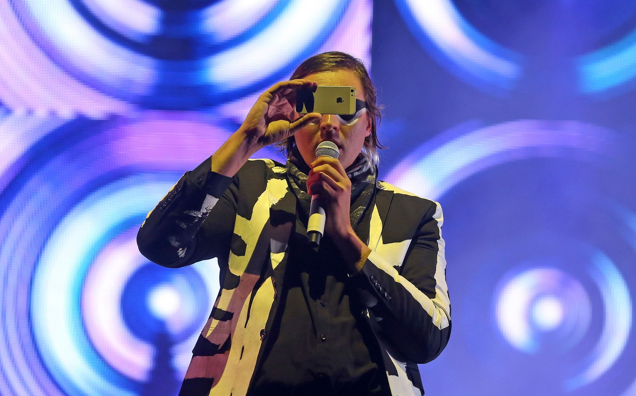 Win Butler, the lead singer of Arcade Fire, performs on the Pyramid Stage at Worthy Farm in Somerset, during the Glastonbury Festival