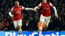 Fotbal, Liga mistrů Arsenal - Bayern: Lukas Podolski a Per Mertesacker