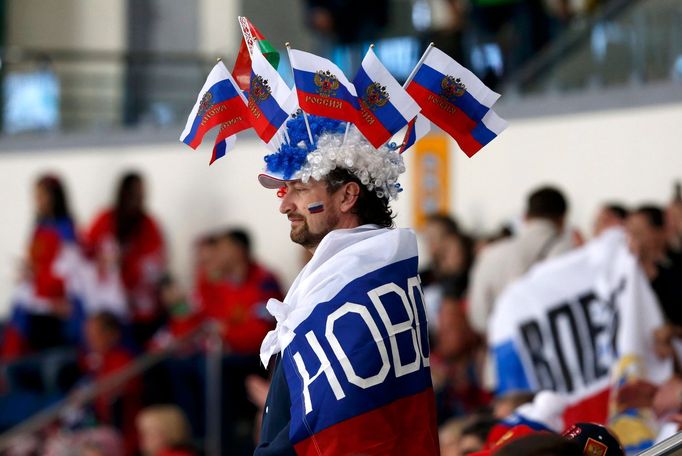 A fan of Russia's team attends their men's ice hockey World Championship group B game against Kazakhstan at Minsk Arena in Minsk May 14, 2014. REUTERS/Alexander Demianchu