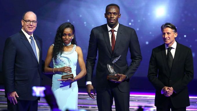 Almaz Ayanaová a Usain Bolt s oceněním.