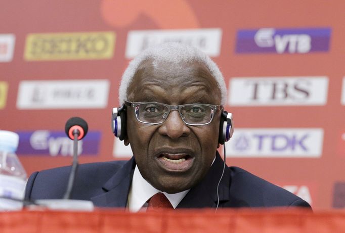 FILE PHOTO: President of International Association of Athletics Federations (IAAF) Lamine Diack answers a question at a news conference in Beijing, China in this August 2