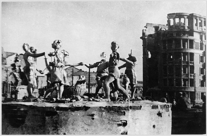 RUINED STALINGRAD The ruins of the city, after its liberation. A sculpture of dancing children survives, though battered, like Stalingrad itself... Date: 1942 Source: Unattributed photograph in Meledin Collection