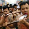 Probodané tváře na thajském festivalu vegetariánů