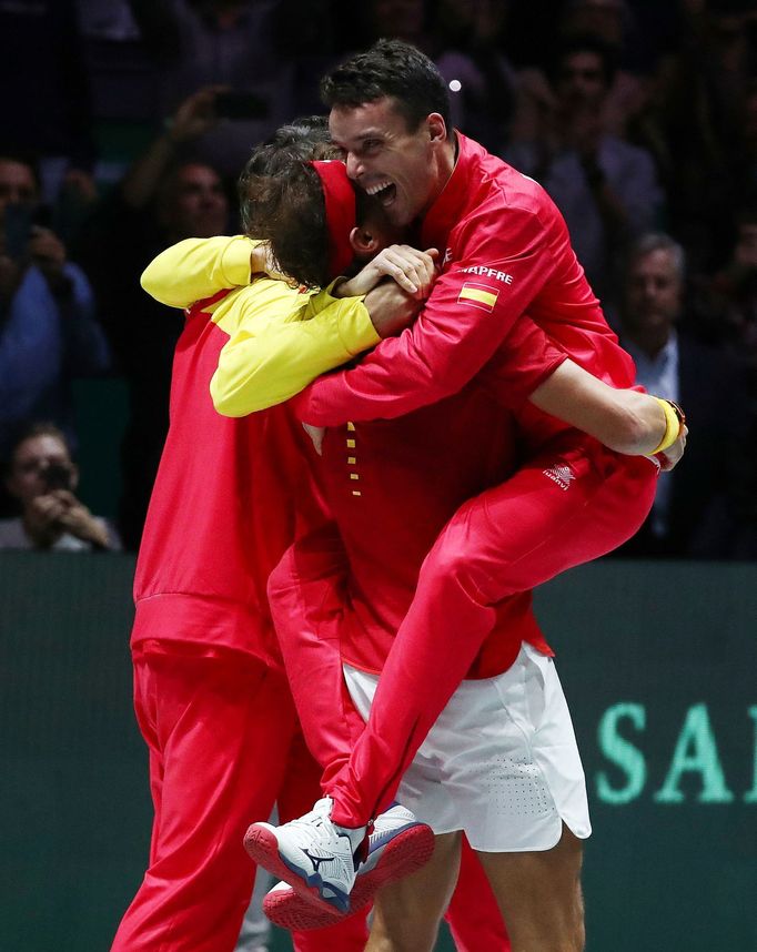 Tennis - Davis Cup Finals - Final - Caja Magica, Madrid, Spain - November 24, 2019   Spain's Rafael Nadal celebrates with Roberto Bautista Agut after winning his match ag