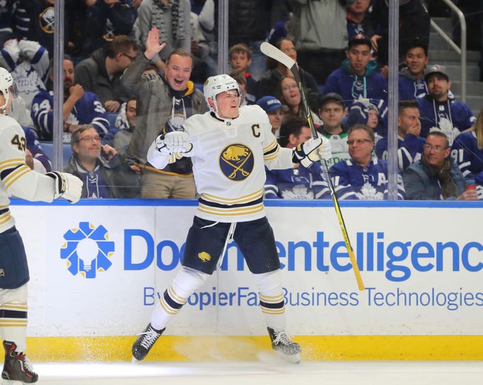 Nov 29, 2019; Buffalo, NY, USA; Buffalo Sabres center Jack Eichel (9) celebrates his goal during the second period against the Toronto Maple Leafs at KeyBank Center. Mand