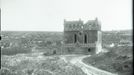 Zničená synagoga v Husjatyně, východní Halič, přibližně 1917.