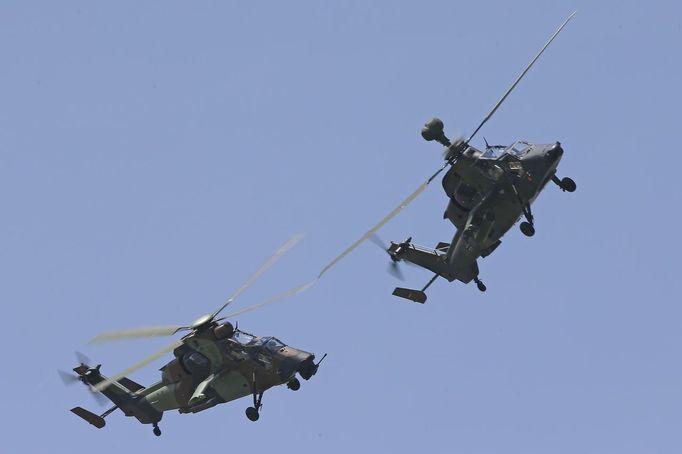 Eurocopter Tiger H61 helicopters take part in a flying display, during the opening of the 50th Paris Air Show, at the Le Bourget airport near Paris, June 17, 2013. The Paris Air Show runs from June 17 to 23. REUTERS/Pascal Rossignol (FRANCE - Tags: TRANSPORT BUSINESS MILITARY)