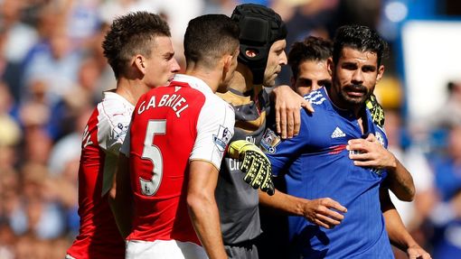 Chelsea's Diego Costa clashes with Arsenal's Gabriel Paulista