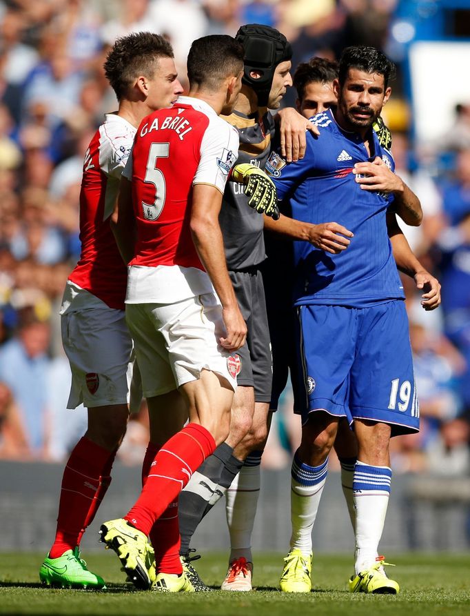 Chelsea's Diego Costa clashes with Arsenal's Gabriel Paulista