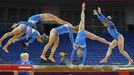 Valeriia Maksiuta of Israel attends a gymnastics training session at the O2 Arena before the start of the London 2012 Olympic Games July 26, 2012. This picture was taken using multiple exposures. REUTERS/Brian Snyder (BRITAIN - Tags: SPORT OLYMPICS SPORT GYMNASTICS) Published: Čec. 26, 2012, 12:22 odp.